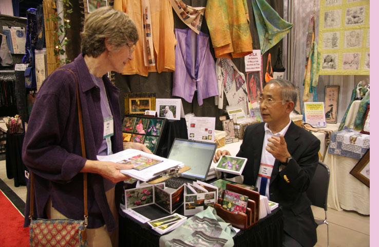 [Trish Grant getting her CD autographed by Takuo Hirata]